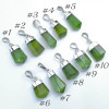 Handgemaakte Peridot hanger, ook wel Olivijn genoemd. Zilveren zetting en ring. Peridot uit Pakistan.