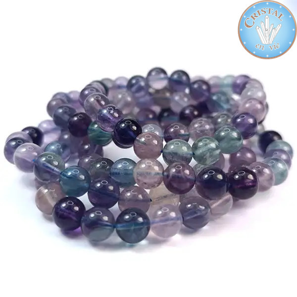 Bracelet en Fluorine, pierre naturelle. Perles de 7 à 8mm. Couleur dominante violet, et bleu, vert.