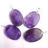 Ciondoli in Ametista. Pietra naturale lucidata e forata con anello in argento 925.