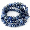 Dumortieriet armbanden, kralen van natuurlijke steen van 8 mm, blauw en zwart van kleur.